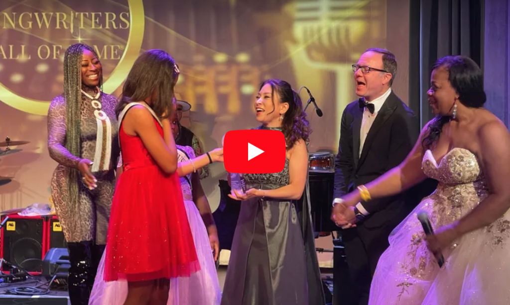 Video still of Soon Hee Newbold receiving an award.